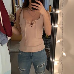 Pale pink lace up tank